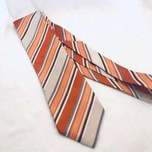 #1586 VTG GEOFFREY BEENE ORANGE STRIPED NECKTIE 57 IN X 3.5 IN